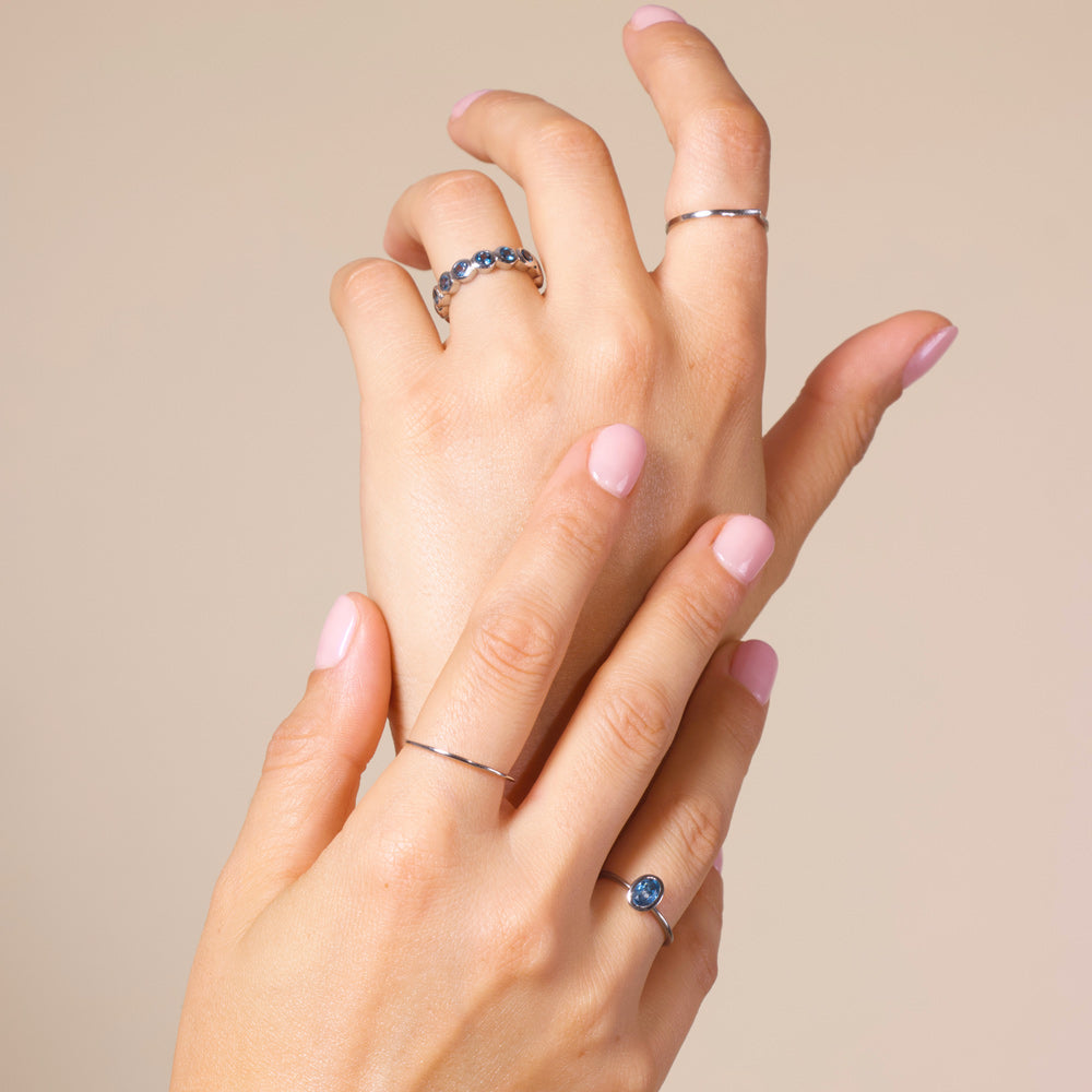 Mix&Match of rings highlighting those with london blue topaz gemstone.